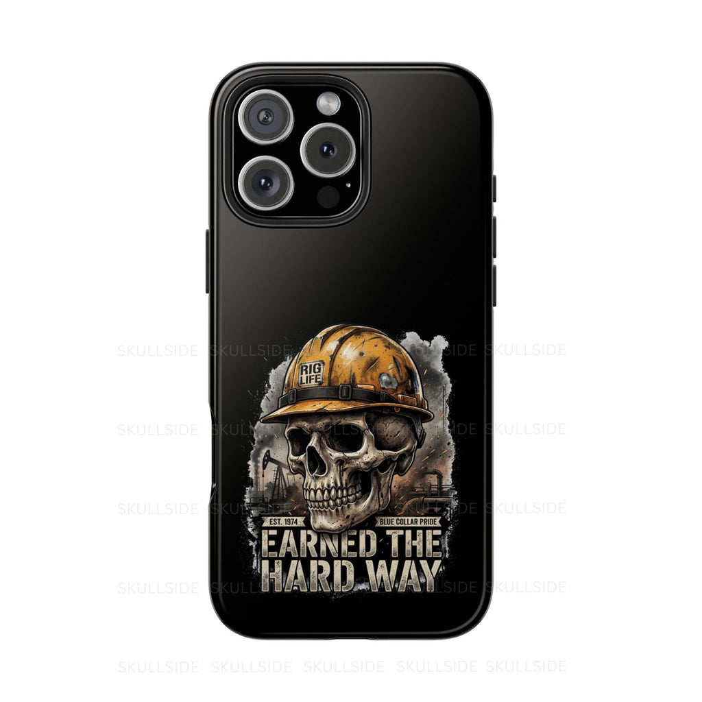 Phone case with skull wearing a hard hat and text 'Earned the Hard Way' on a black background